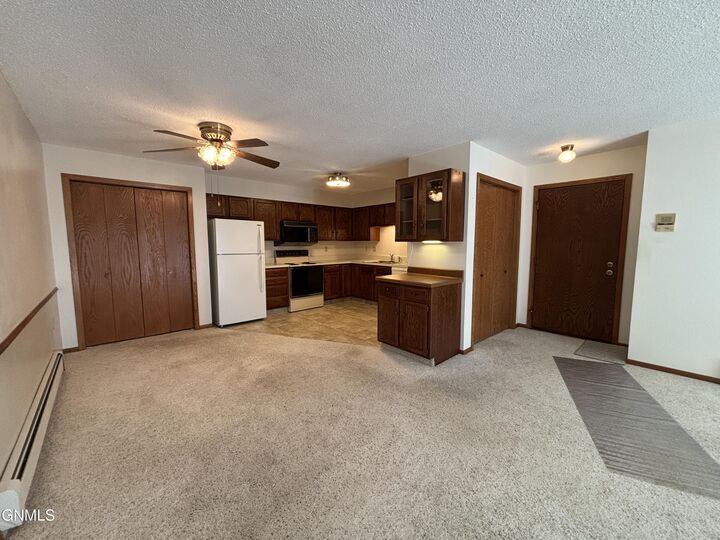 Property Photo:  2126 Kavaney Drive N 10  ND 58501 