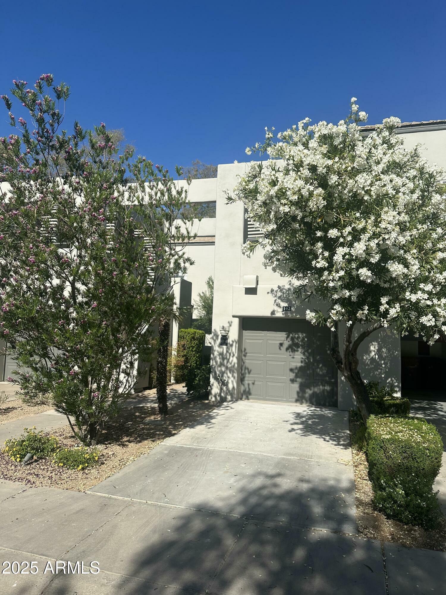 Property Photo: 7710 E Gainey Ranch Road 142 AZ 85258