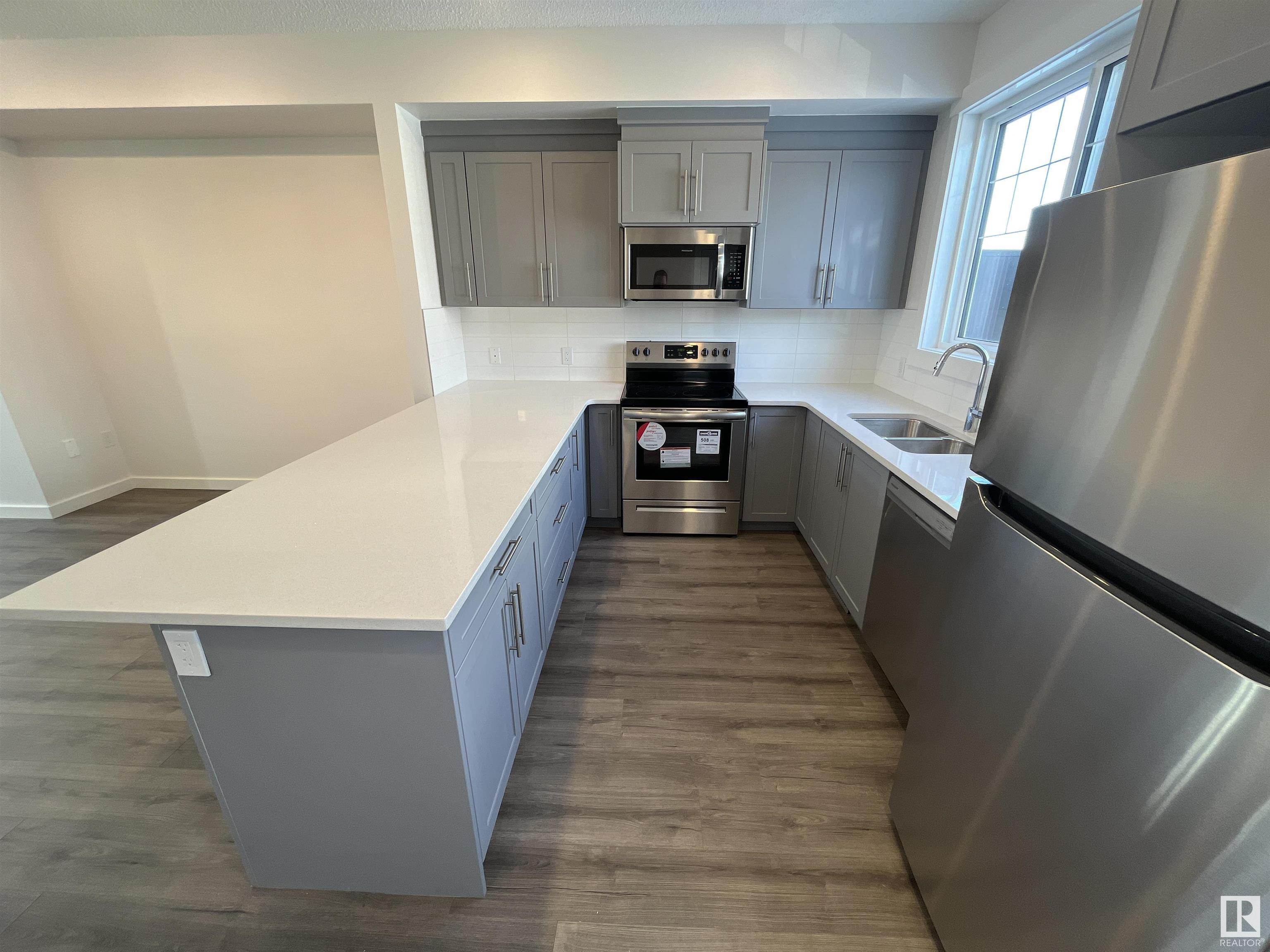 Property Photo: 903 Crystallina Nera Way NW 3 AB T5Z 0N6