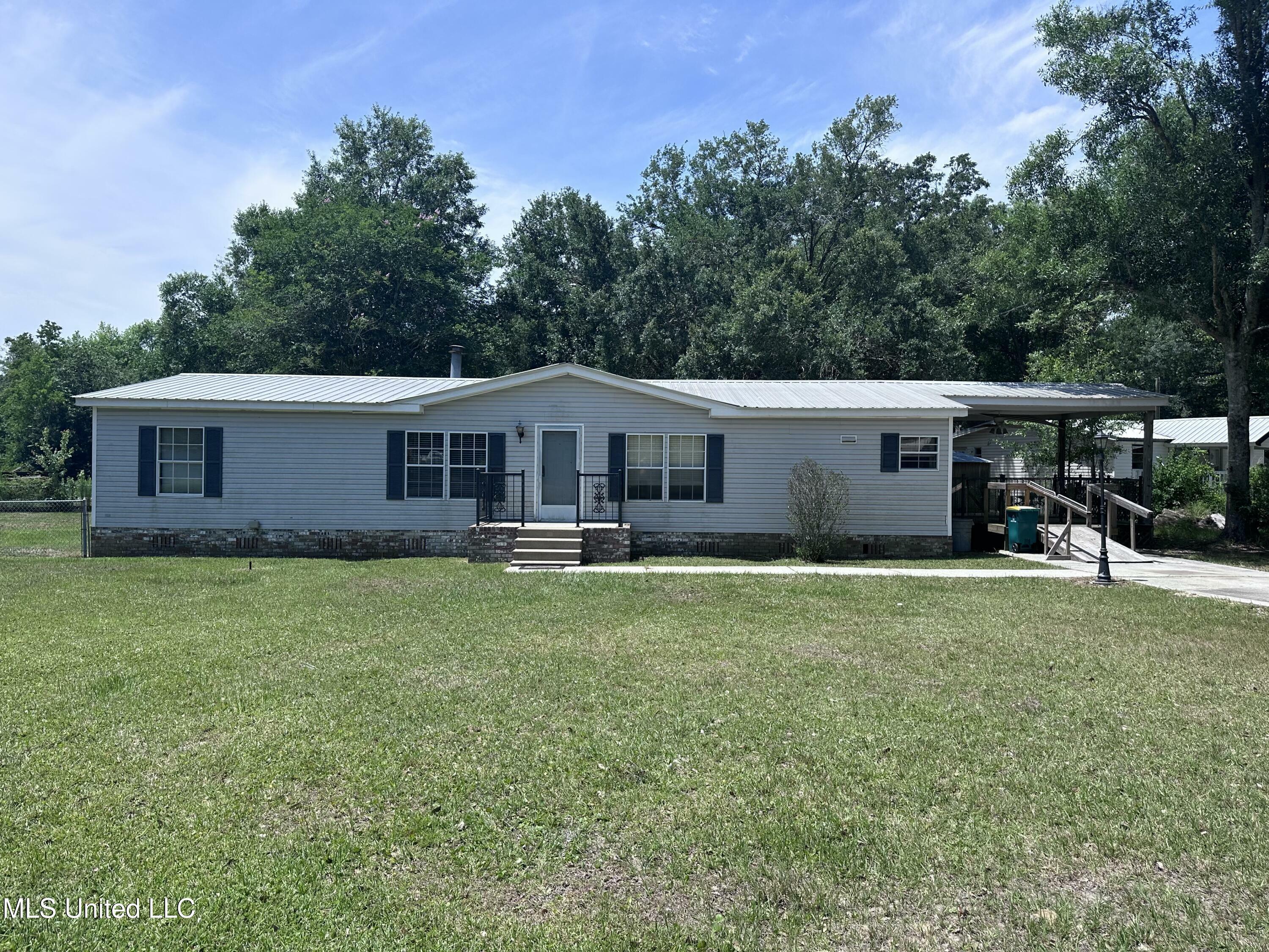 Property Photo: 18241 Robin Oaks Drive MS 39503