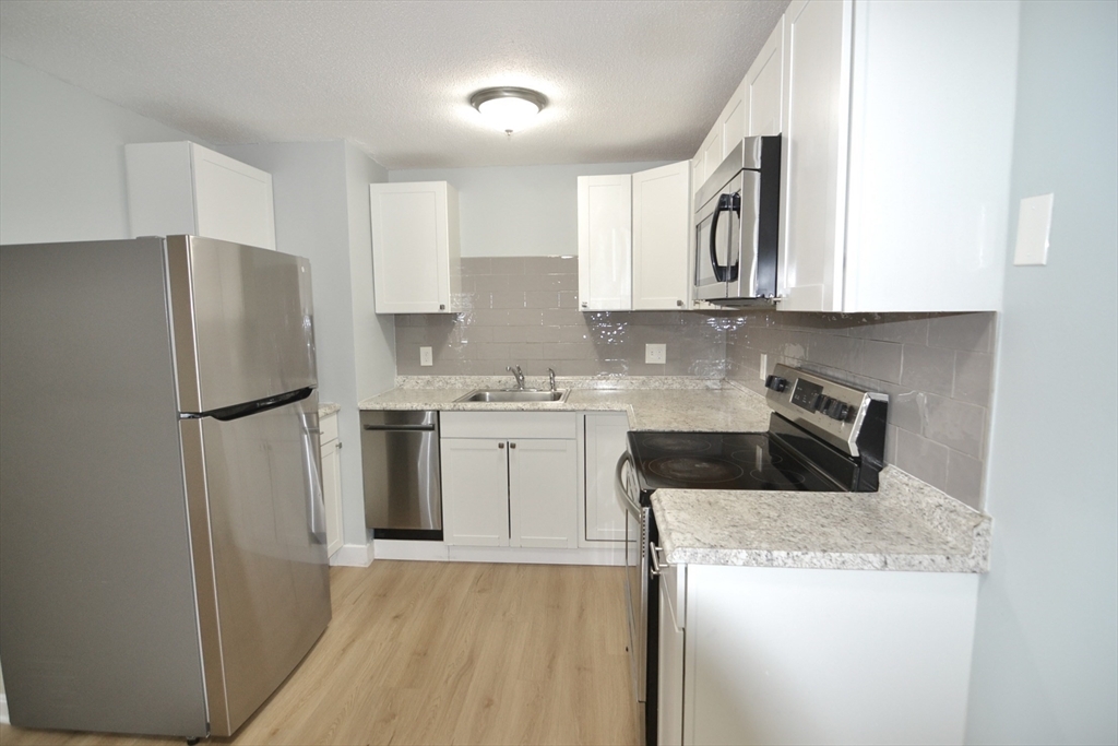 Property Photo:  77 Nicholas Rd I  MA 01701 