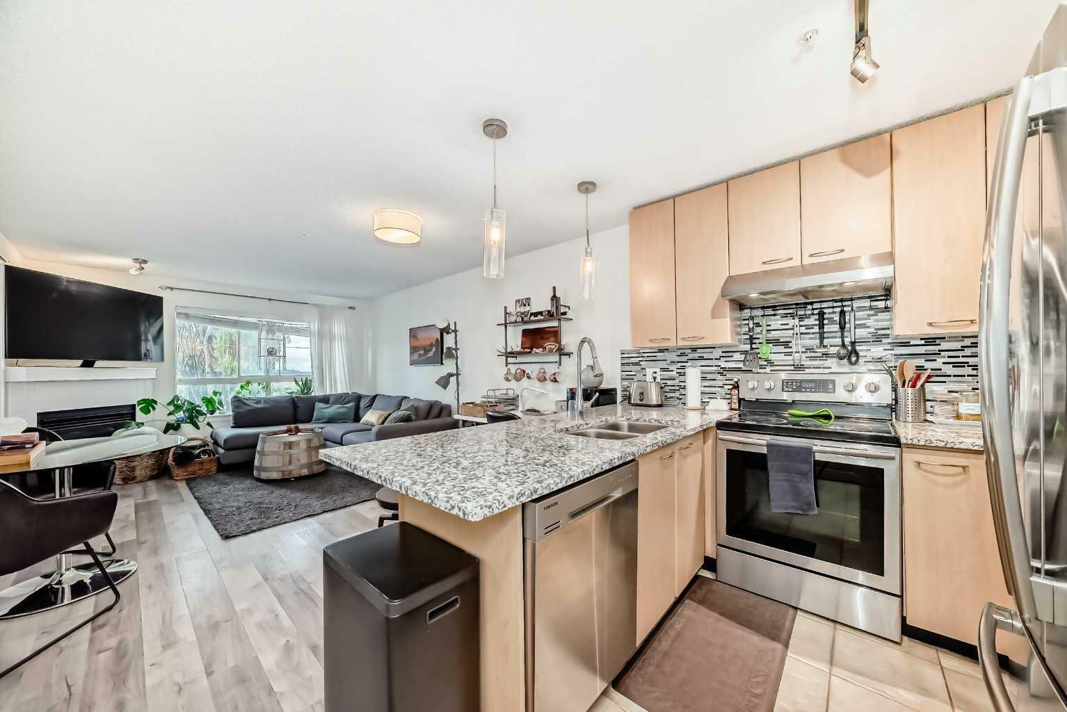 Property Photo: 5115 Richard Road SW 214 AB T3E 7M7