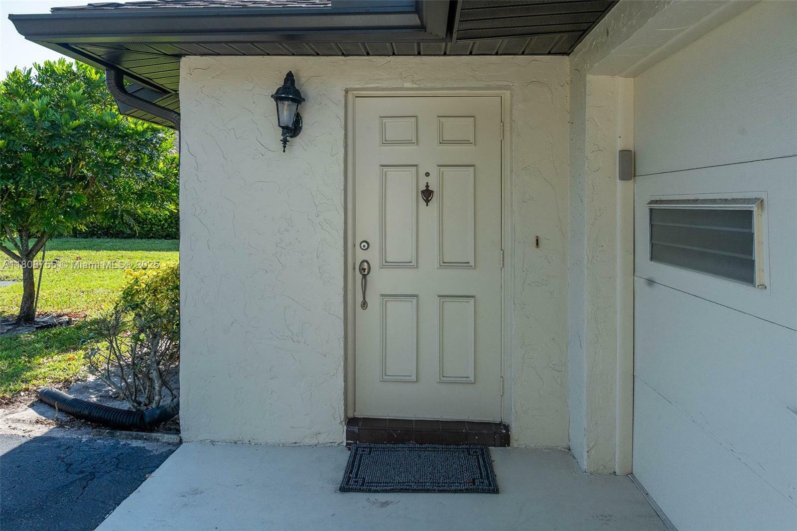 Property Photo:  10198 Dovewood Ln A  FL 33436 