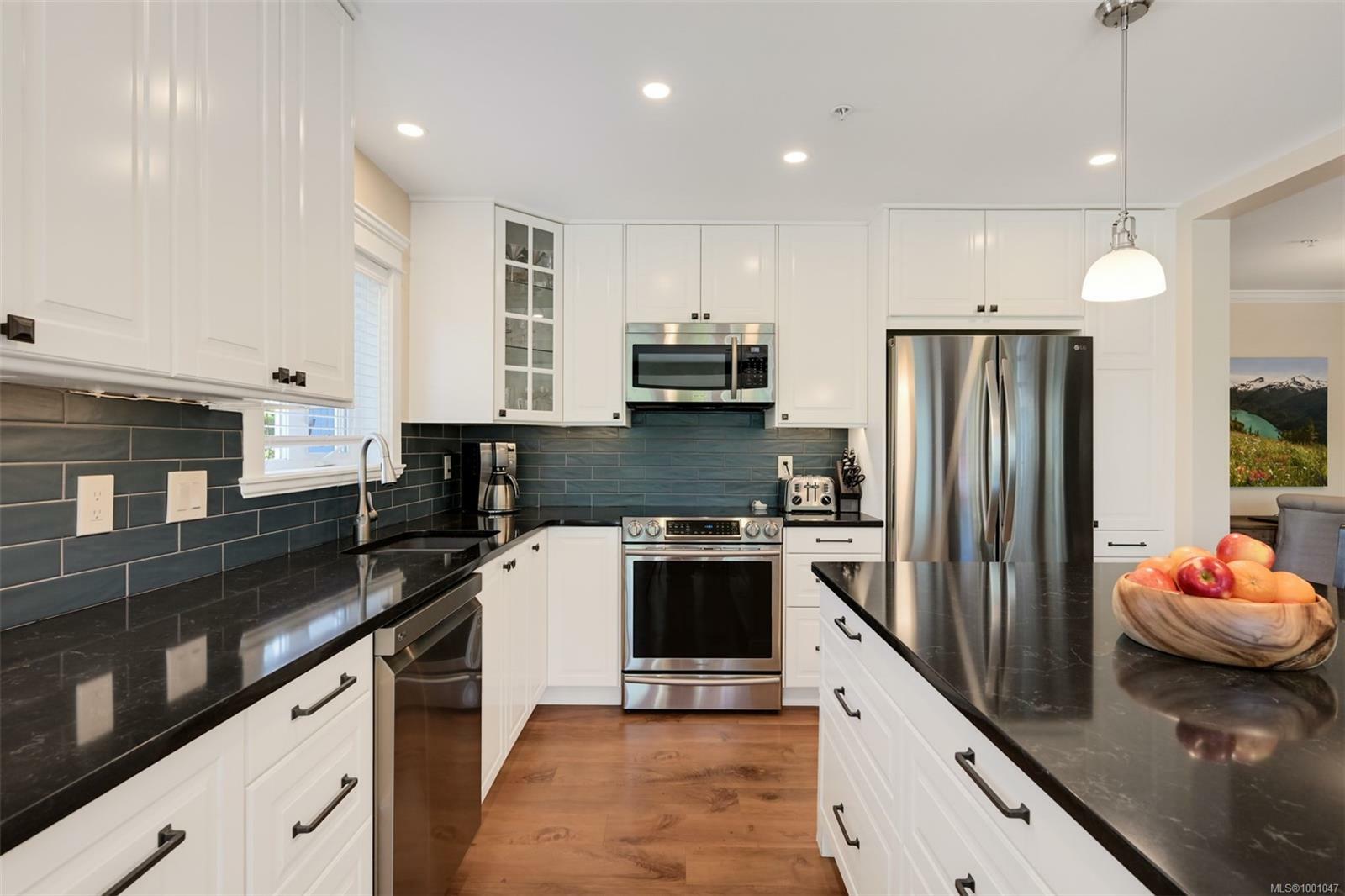 Property Photo: 535 Heatherdale Lane 101 BC V8Z 0A4