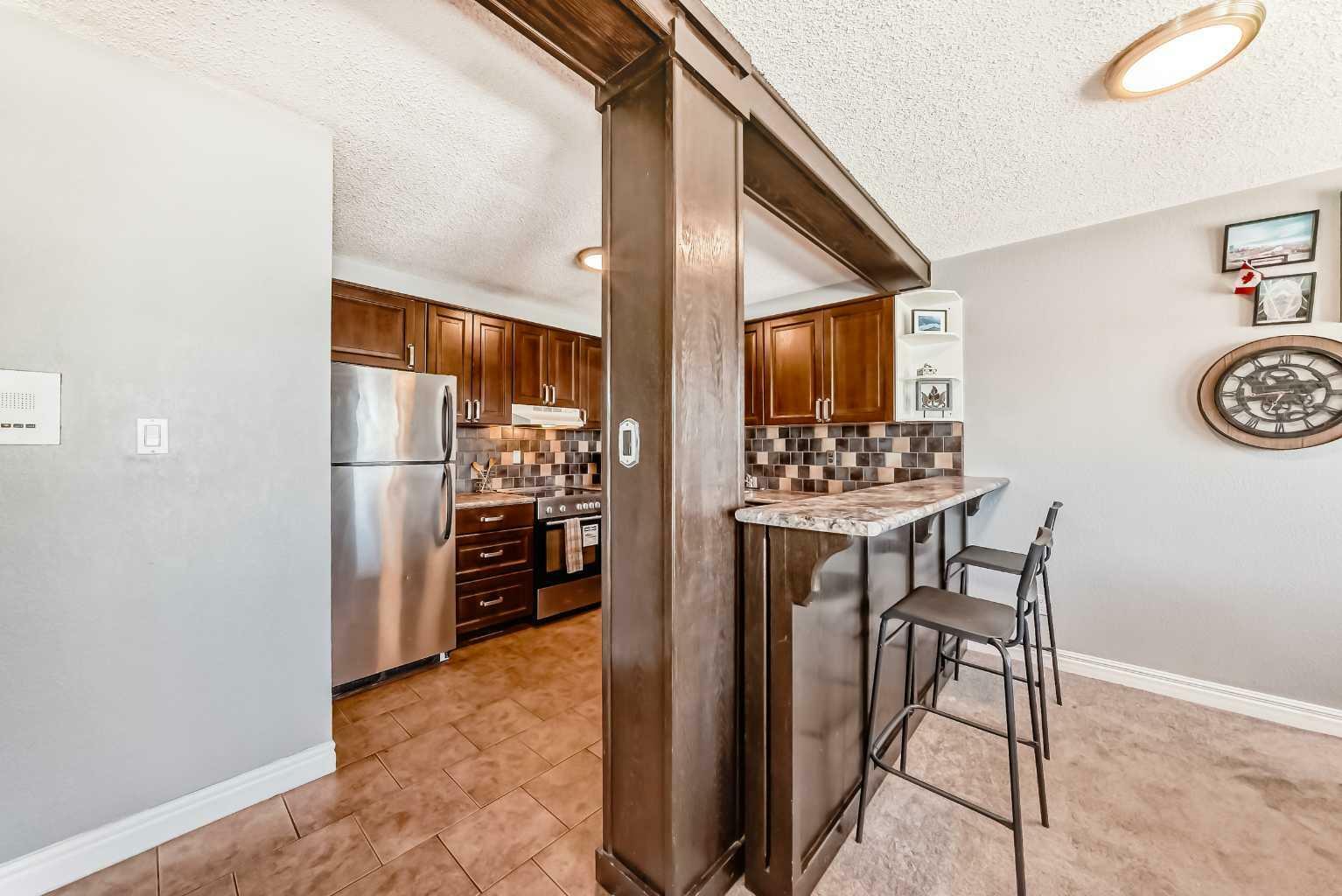 Property Photo: 809 4 Street NE 302 AB T2E 3S9