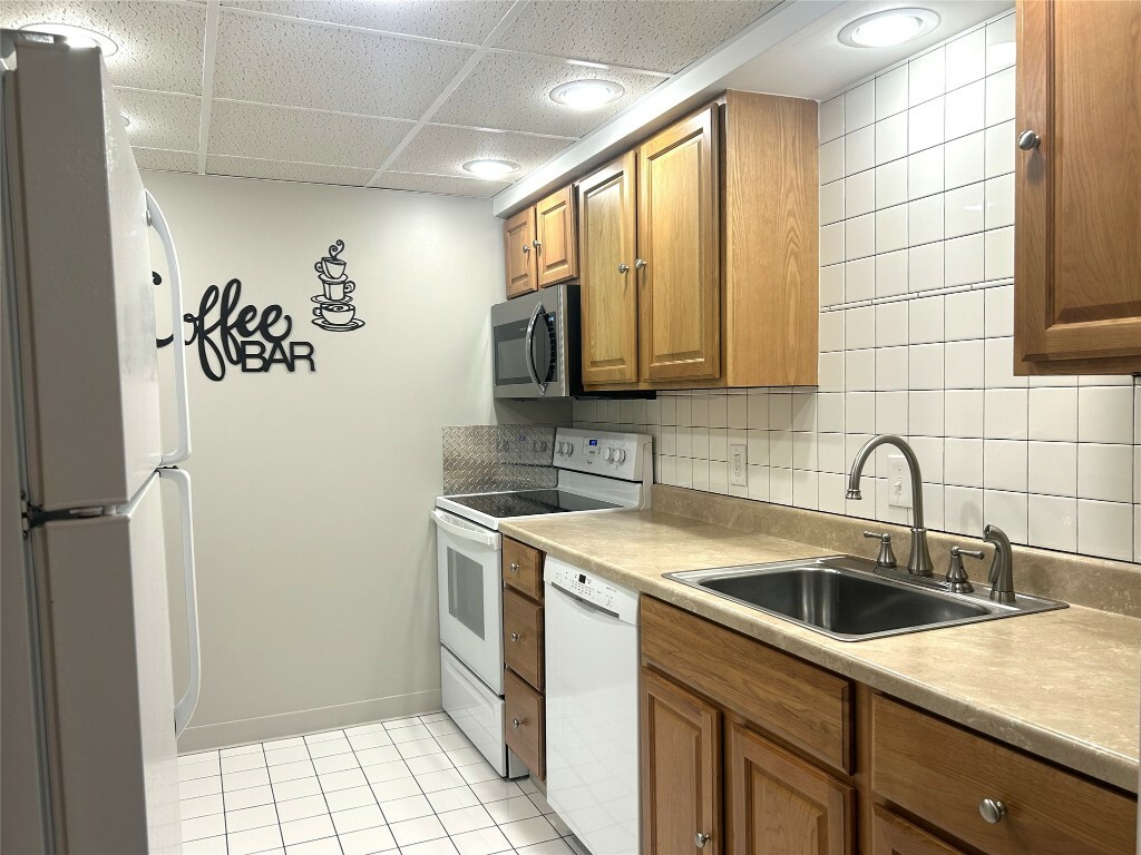 Property Photo: 5 Riverside Drive 106 NY 13905