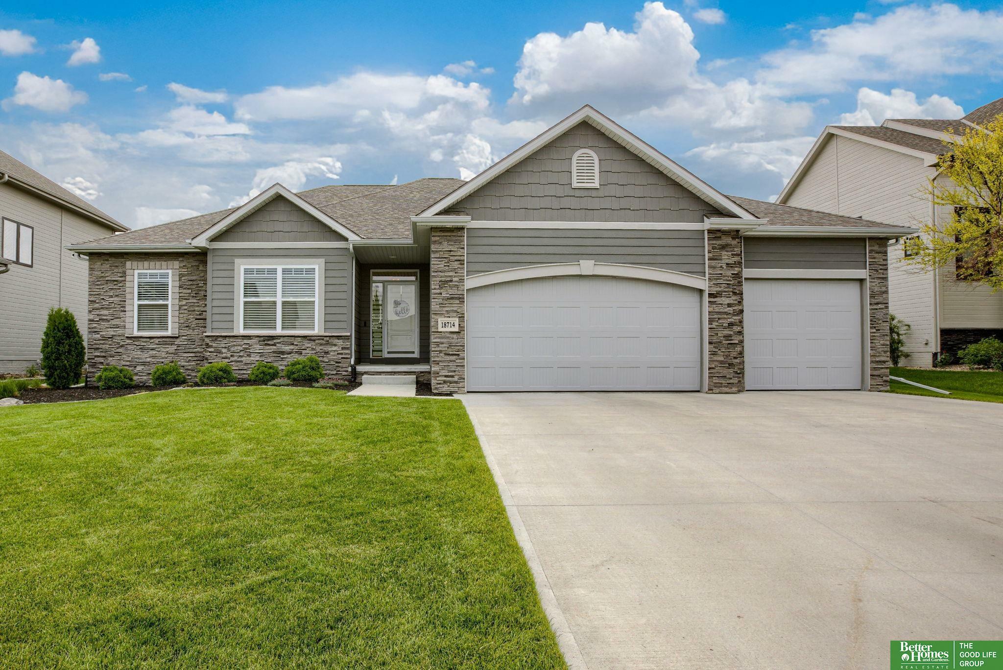 Property Photo: 18714 Schofield Drive NE 68136