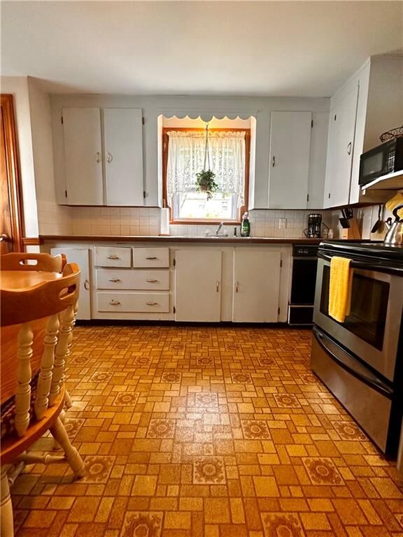 Property Photo:  100 Benedict Street  RI 02861 