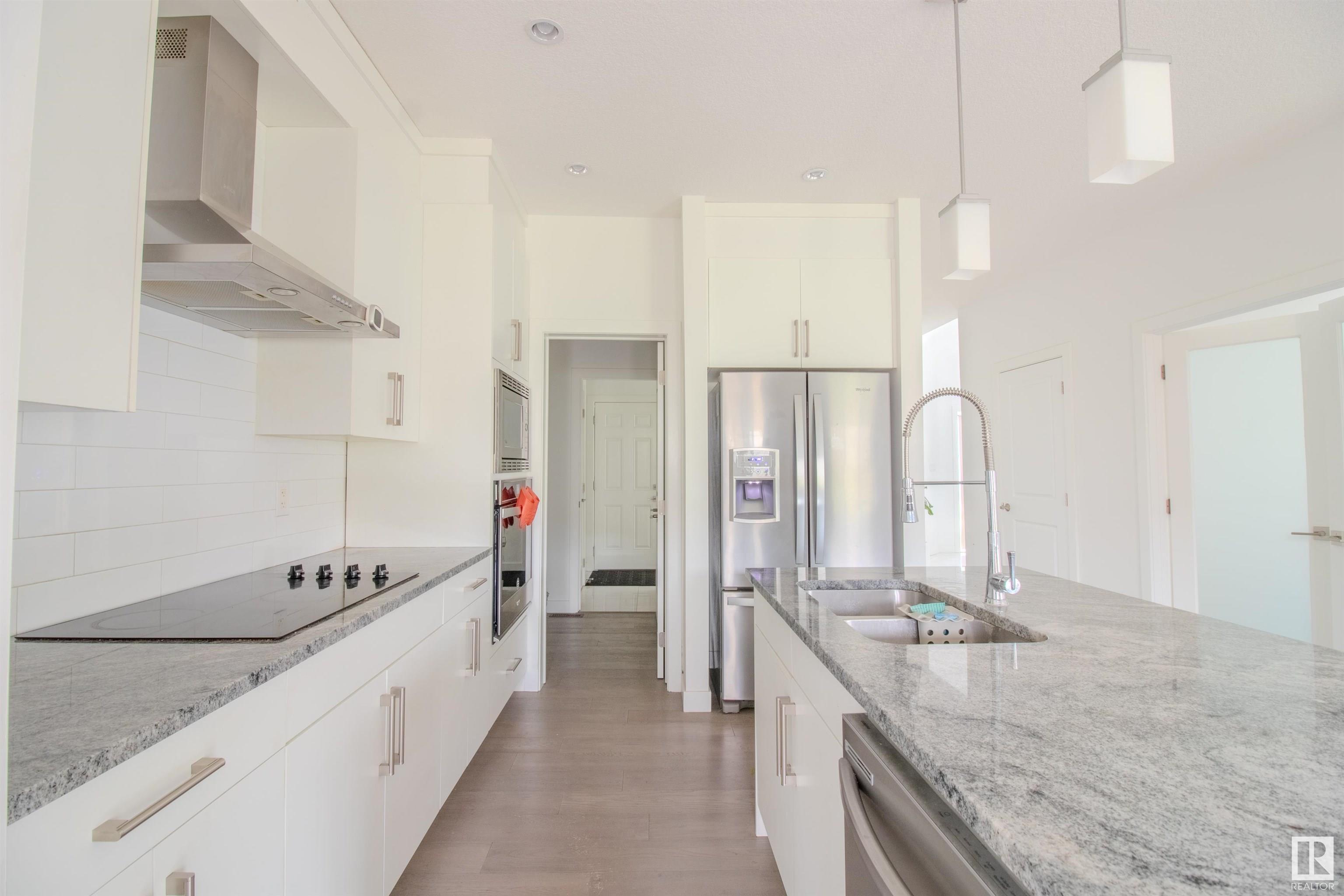 Property Photo: 1124 152 Avenue NW AB T5Y 0Z5