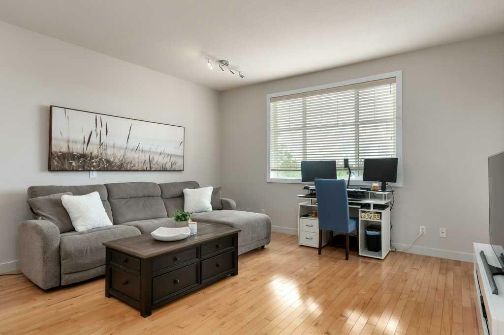 Property Photo:  281 Cougar Ridge Drive SW 105  AB T3H 0J2 