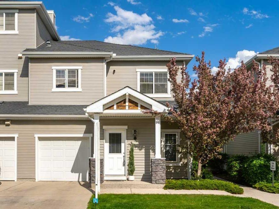 Property Photo: 281 Cougar Ridge Drive SW 105 AB T3H 0J2