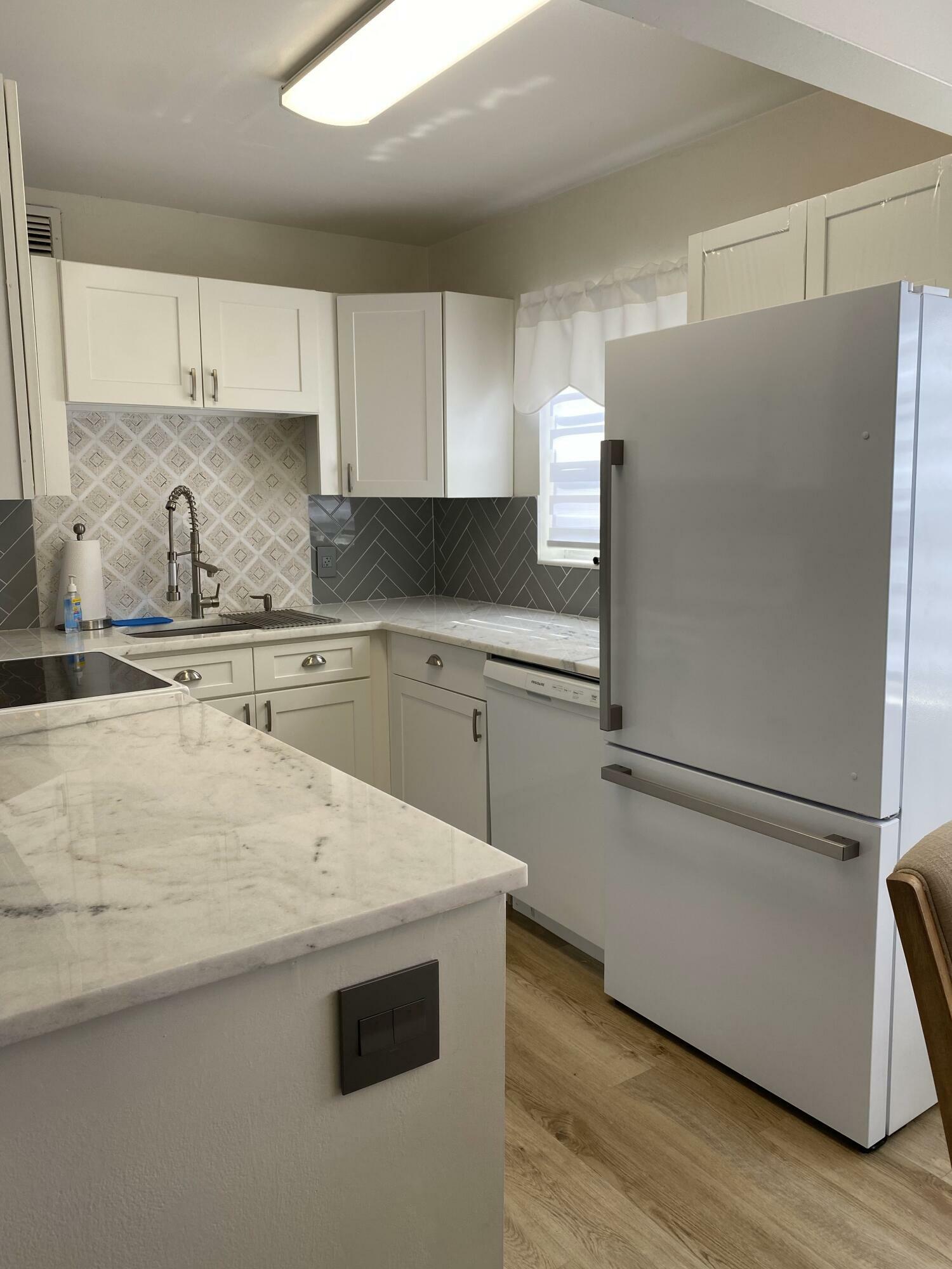 Property Photo: 216 Dorchester J FL 33417