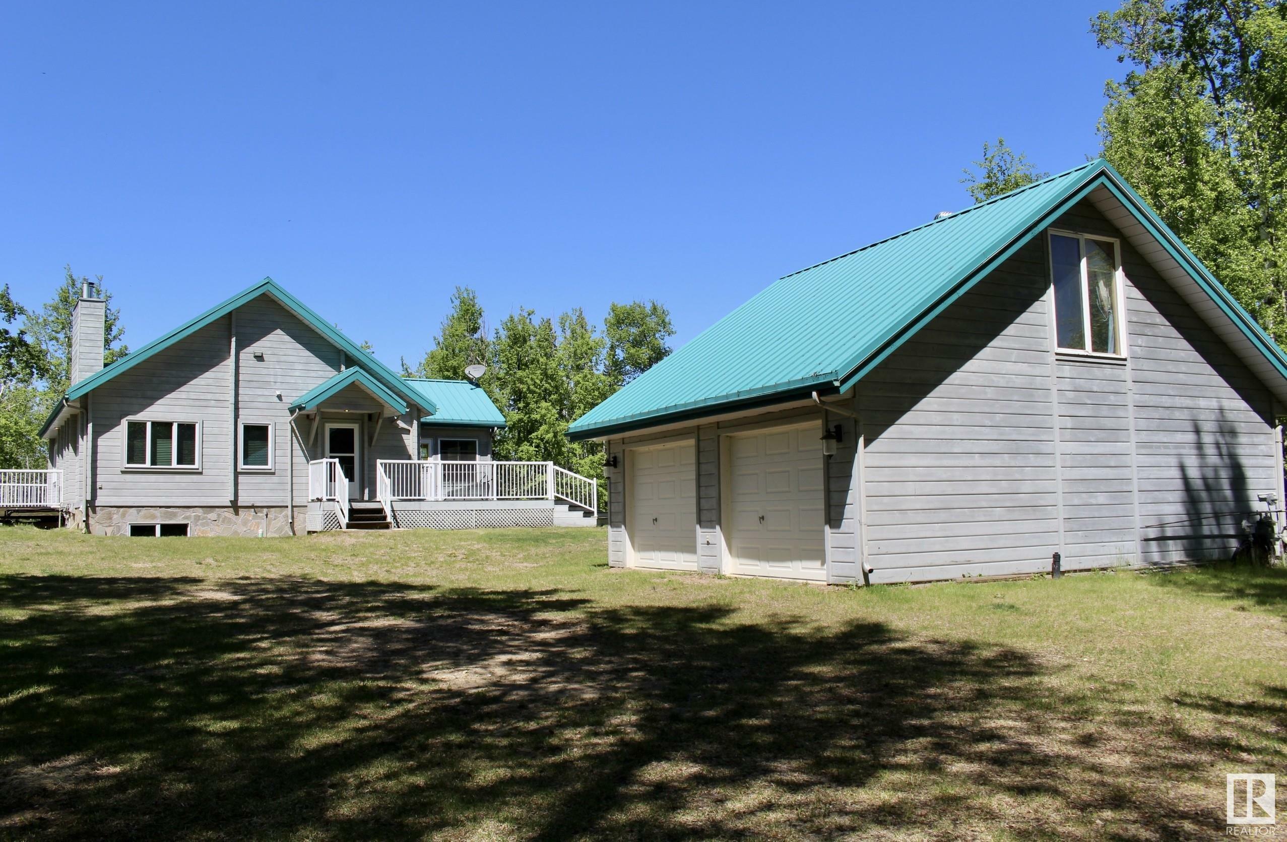 Property Photo:  1007 12272 Twp Rd 602  AB T0A 3E0 