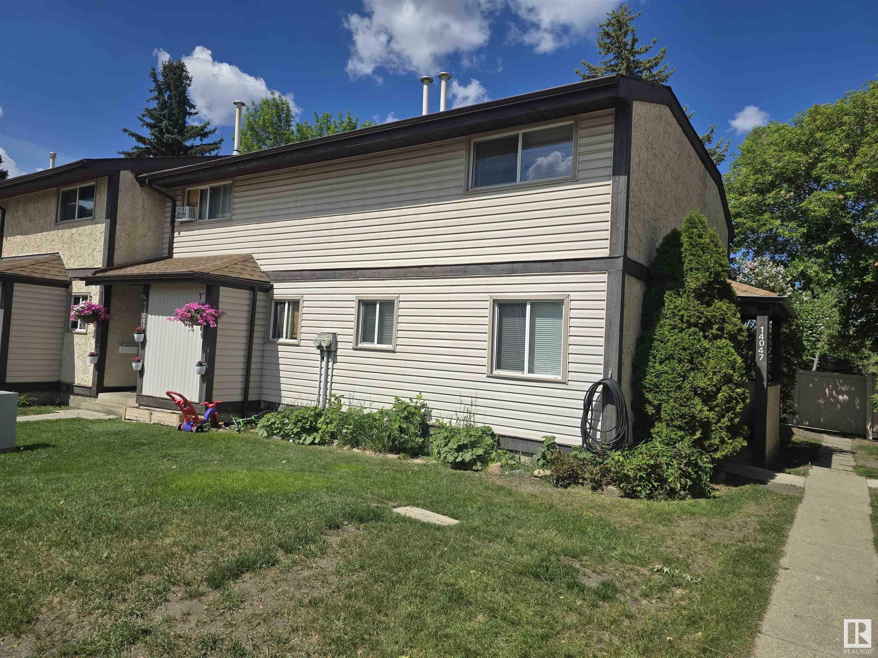 Property Photo: 14047 30 Street NW AB T5Y 1R5