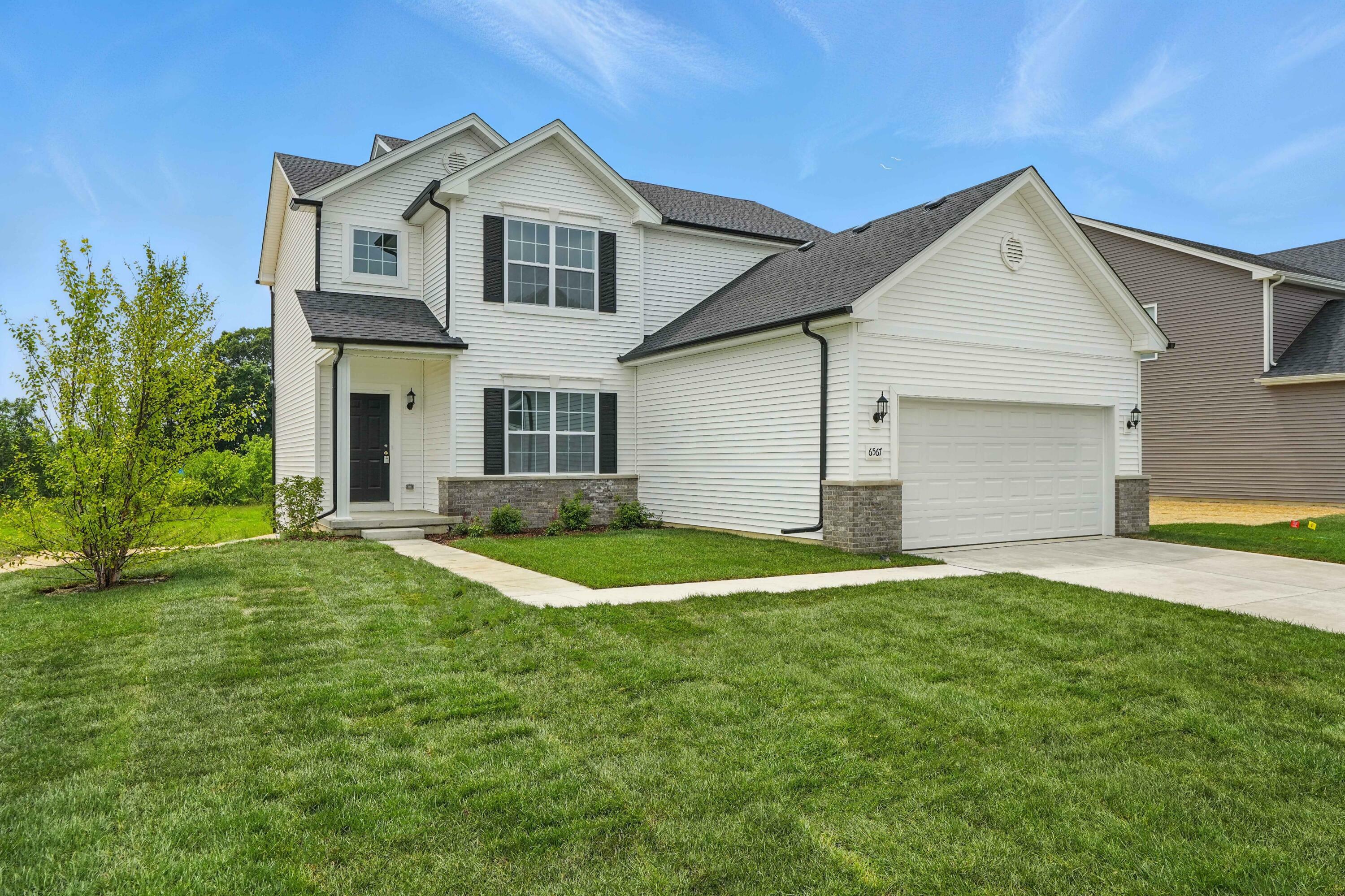 Property Photo: 6567 E 104th Avenue IN 46307