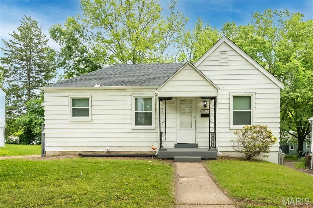 Property Photo:  7117 Lamont Drive  MO 63136 