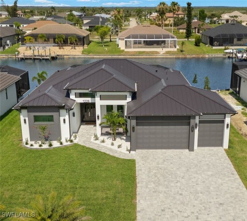 Property Photo: 1228 NW 40th Place FL 33993