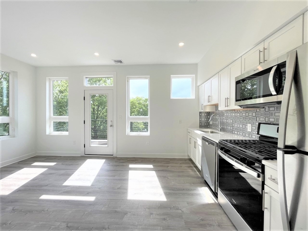 Property Photo: 302 Broadway 403 MA 02149