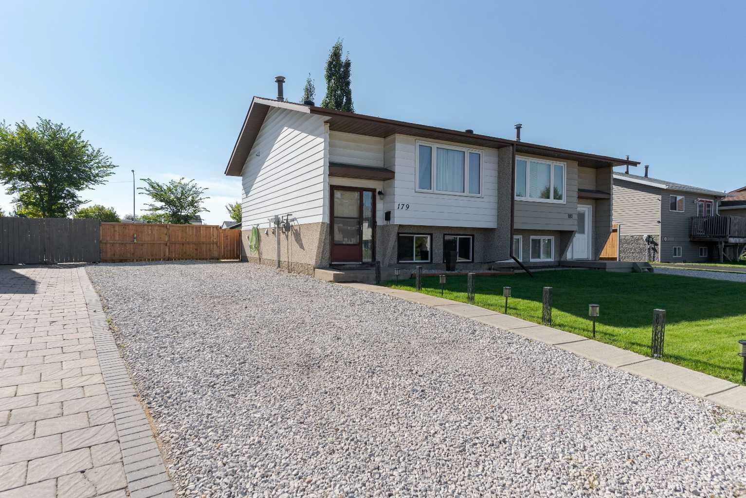 Property Photo: 179 Cochrane Crescent AB T9K 1H1