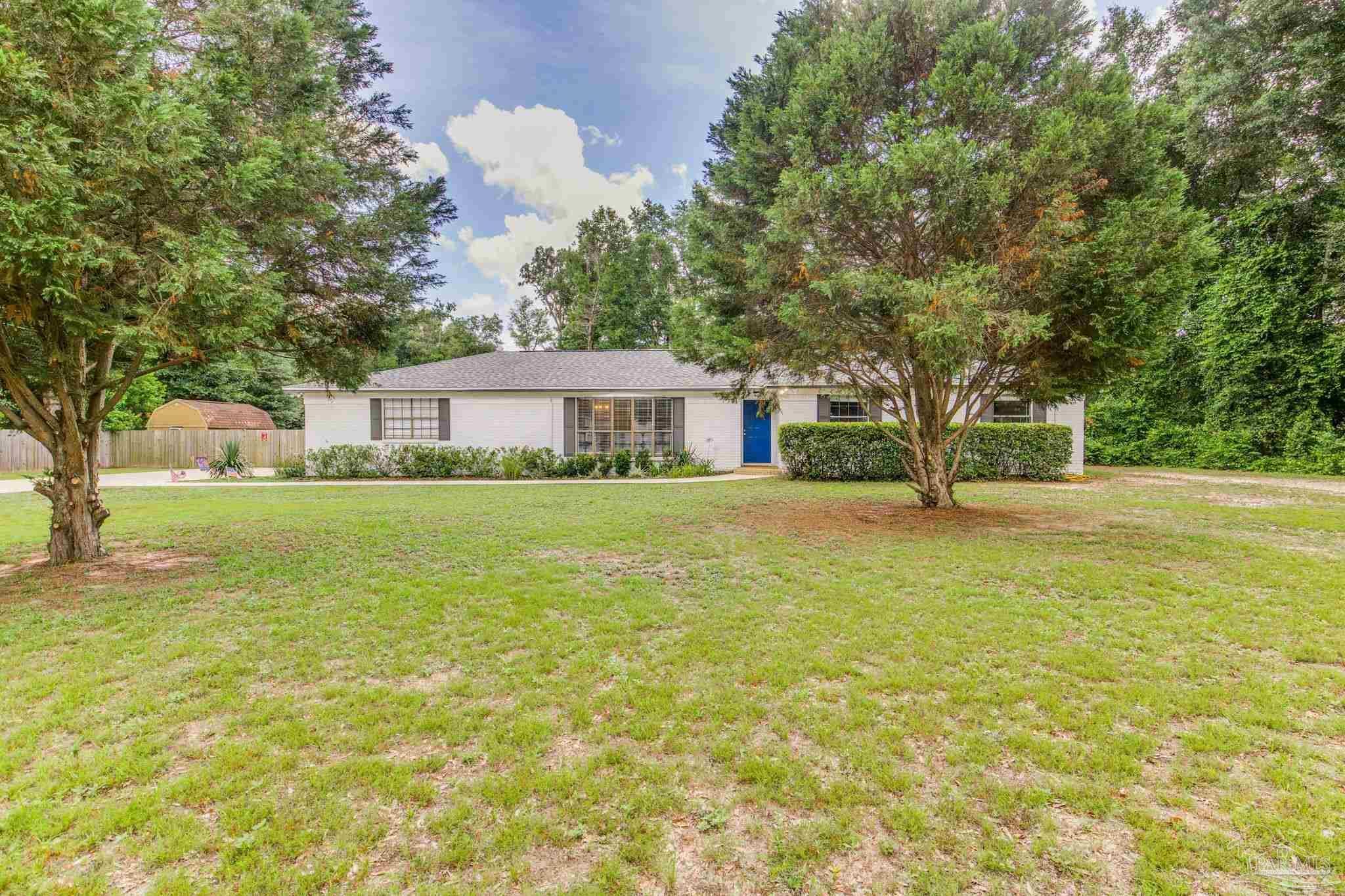 Property Photo: 5945 Pamela Dr FL 32570