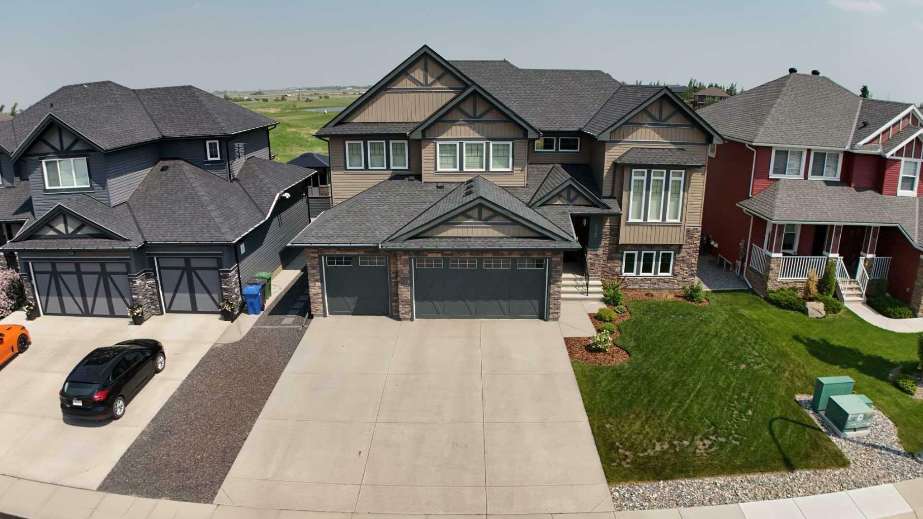 Property Photo:  312 Boulder Creek Crescent SE  AB T0J 1X3 