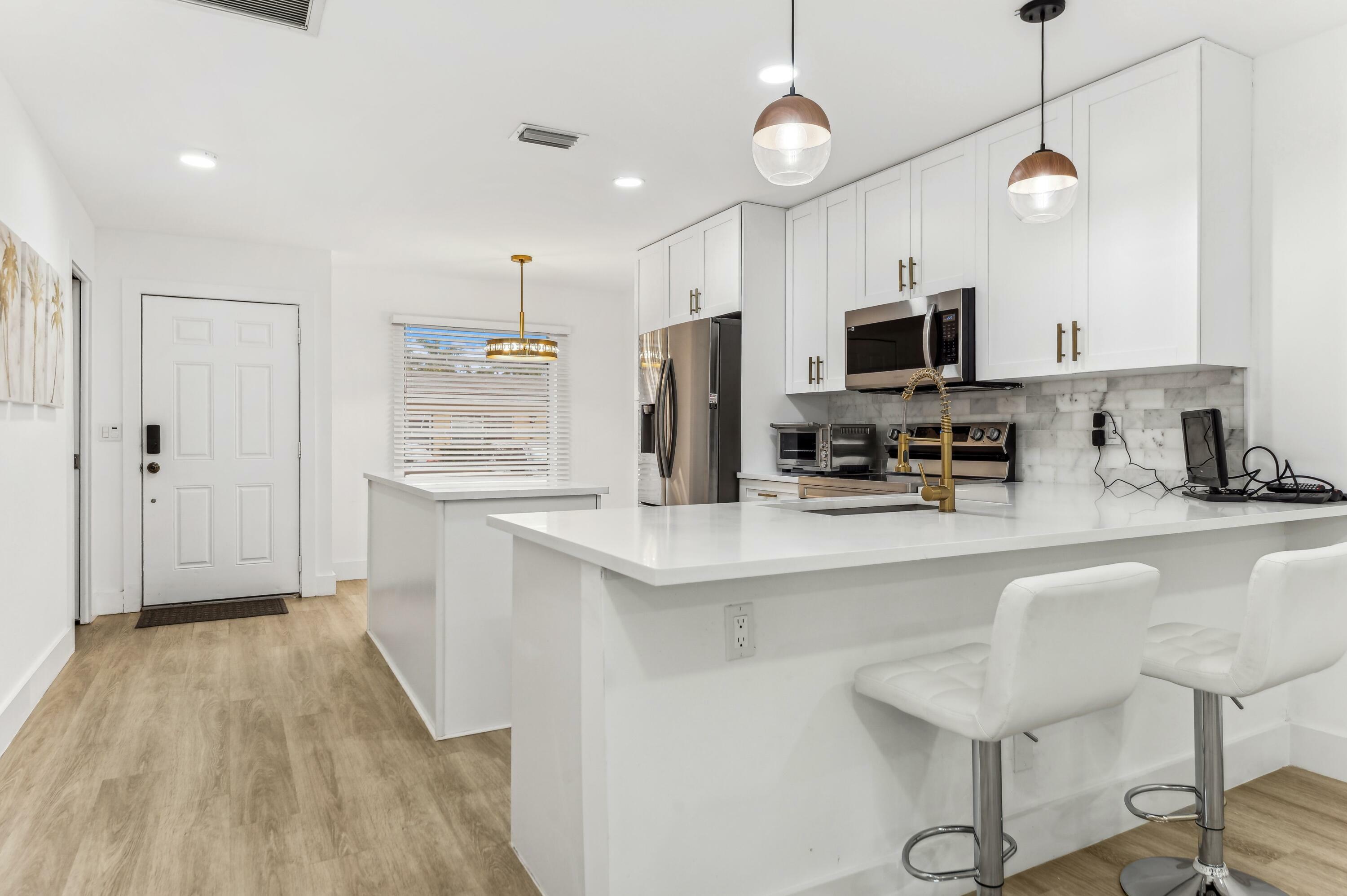 Property Photo: 13725 Flora Place D FL 33484