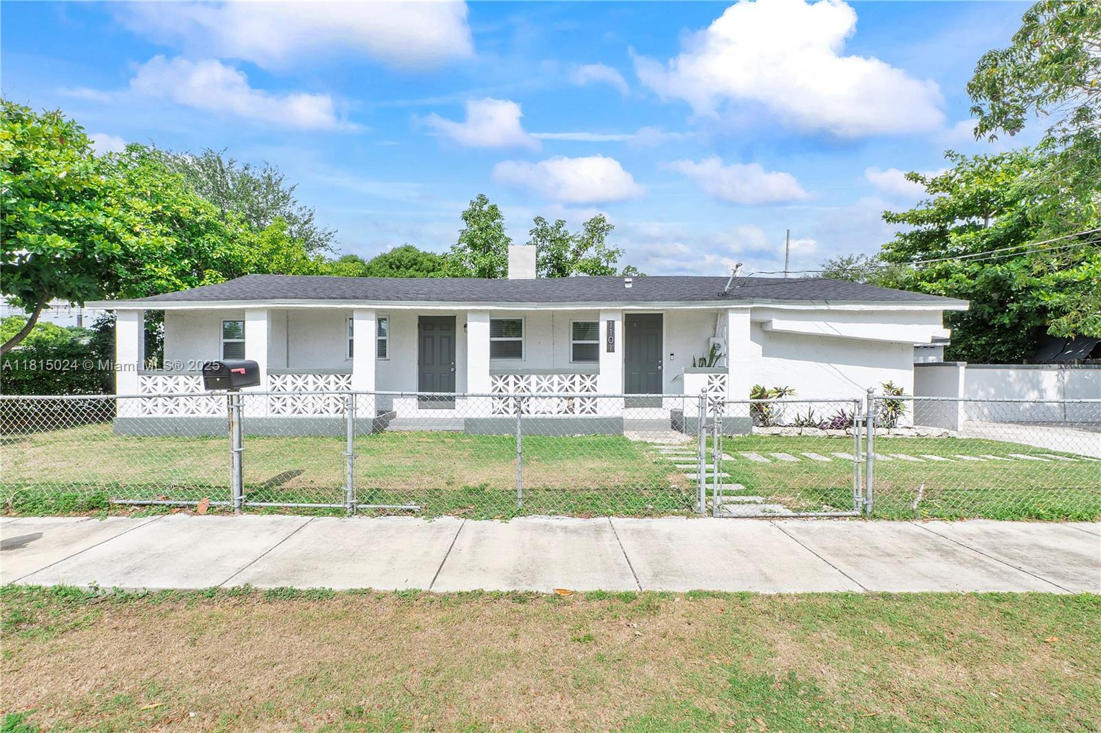 Property Photo:  1101 NW 40th St  FL 33127 