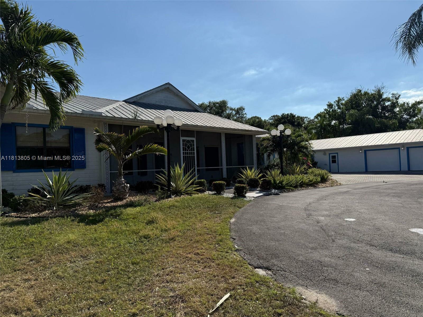 Property Photo:  5584 SW Quail Hollow St  FL 34990 