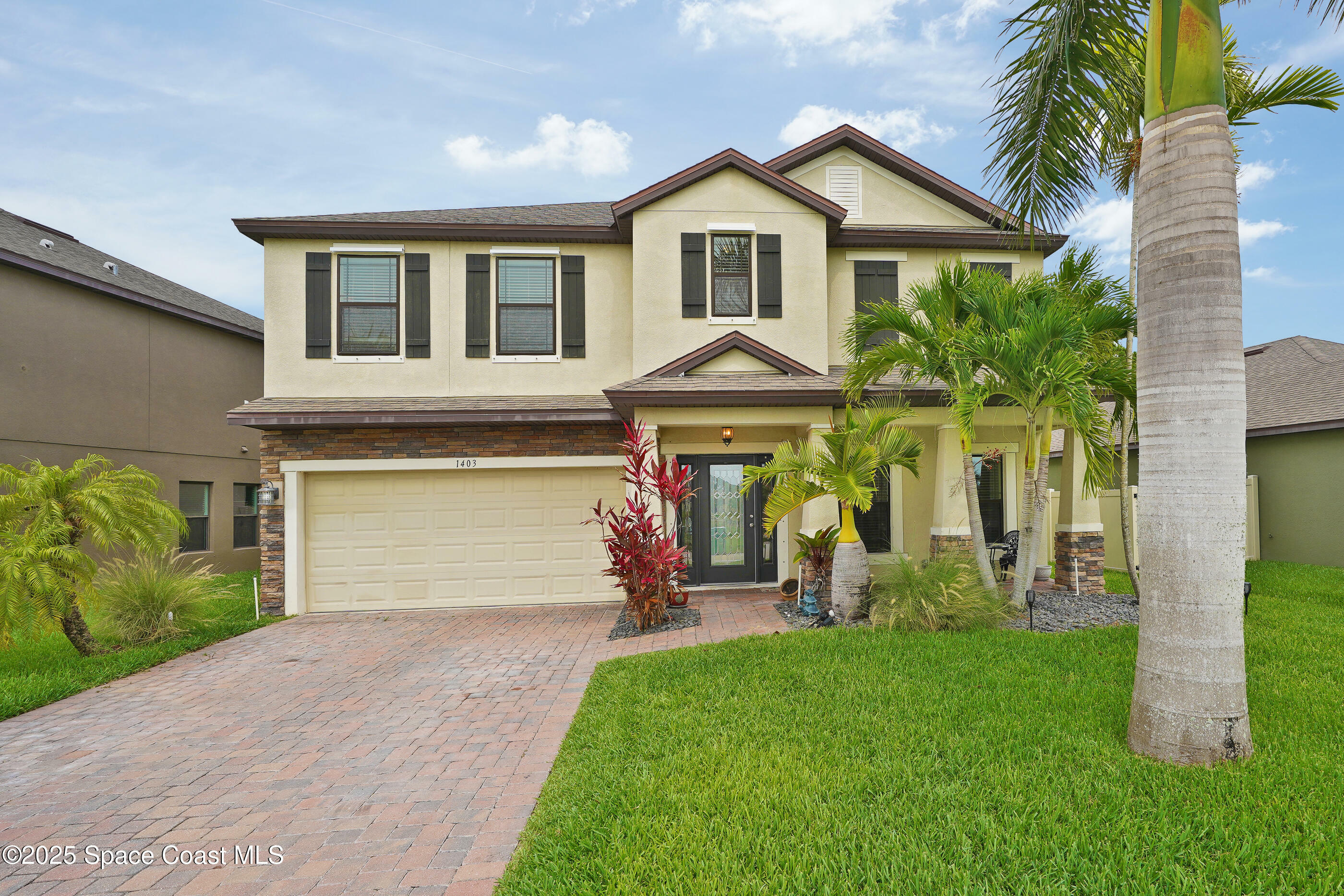 Property Photo: 1403 Musgrass Circle FL 32904