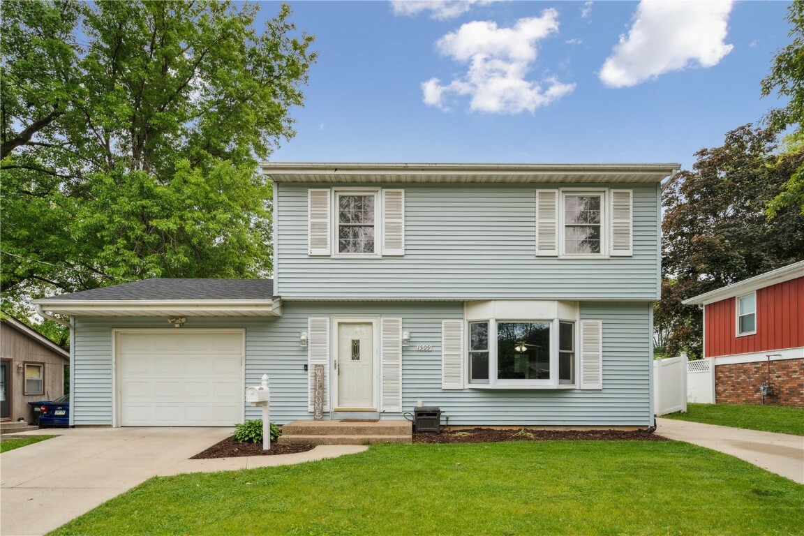 Property Photo:  1509 Brookwood Drive  IA 52240 