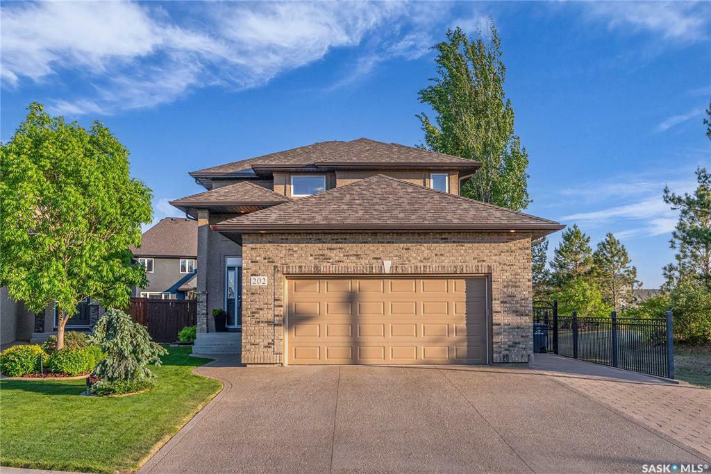 Property Photo: 202 Robertson Cove SK S7T 0E3