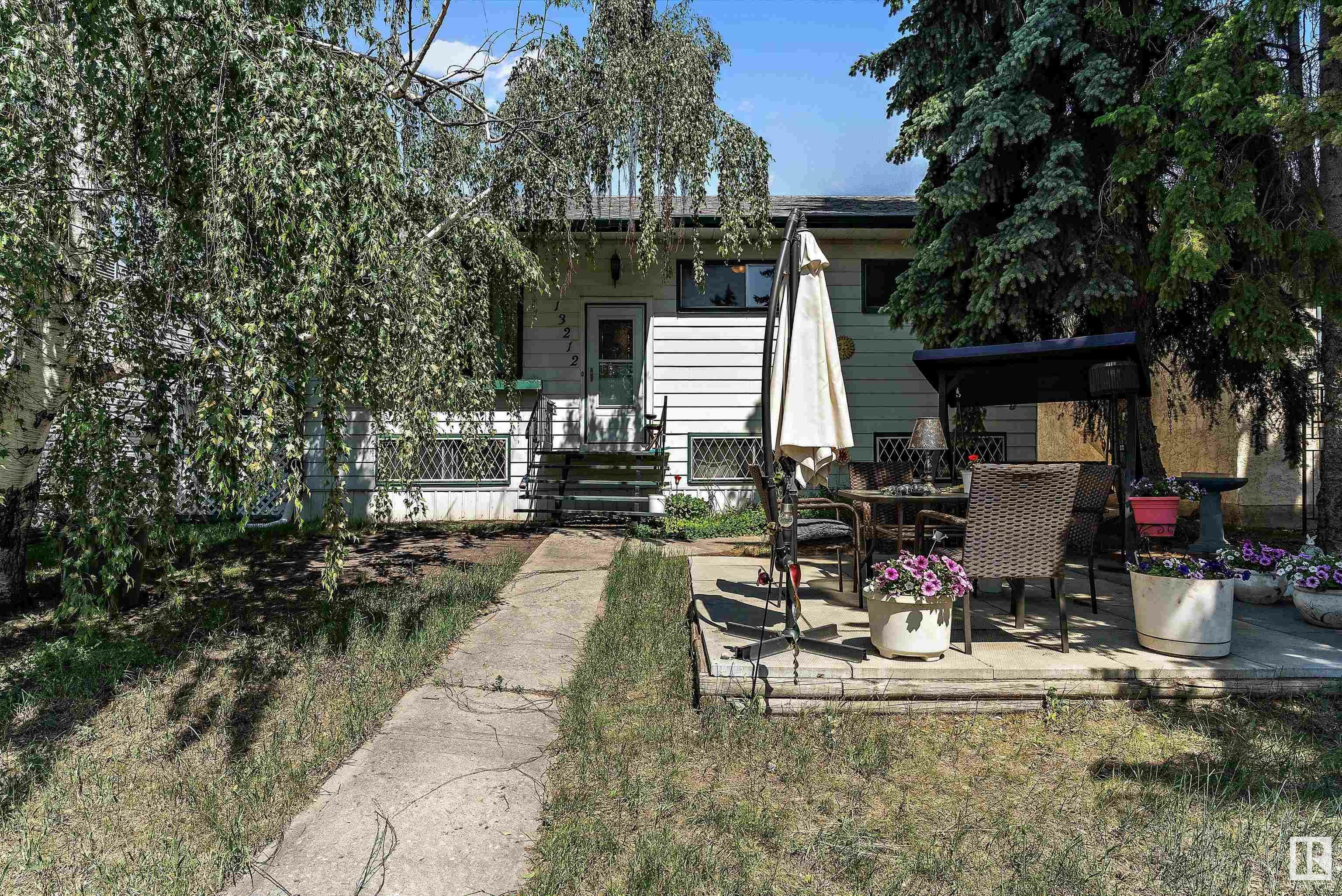 Property Photo: 13212 128 Avenue NW AB T5L 3H2