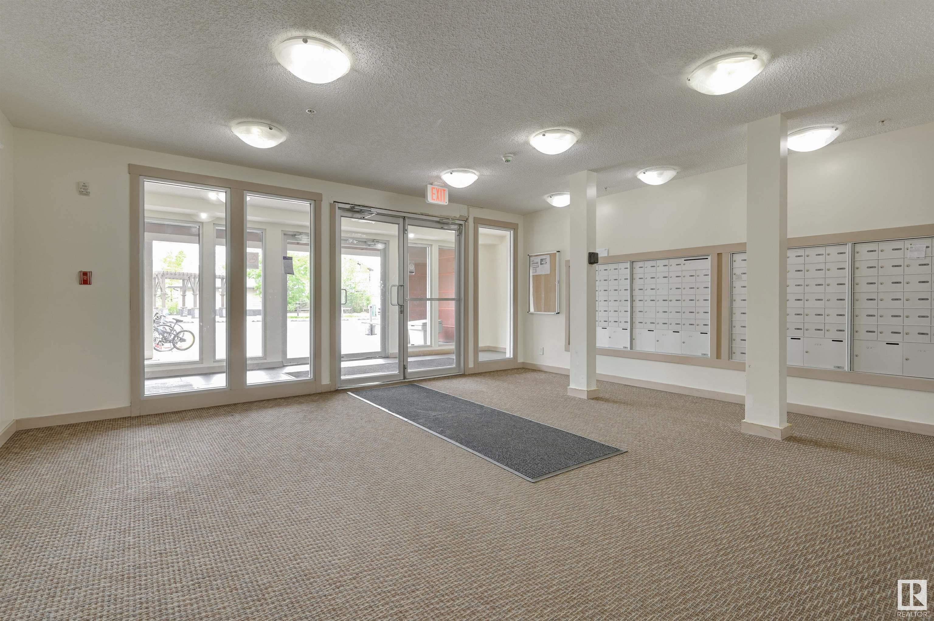 Property Photo: 3315 James Mowatt Trail SW 422 AB T6W 3L9