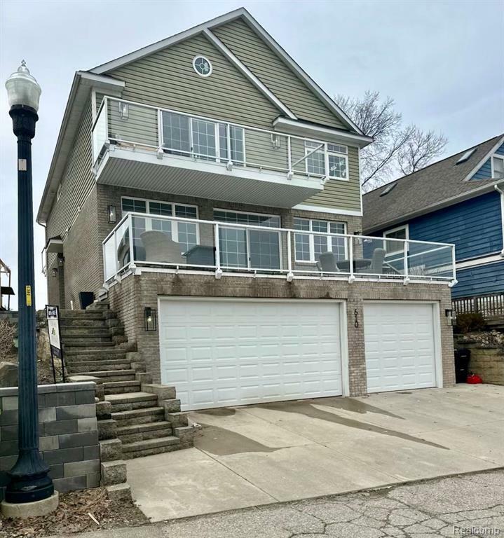 Property Photo: 610 Longpointe Drive MI 48362 2343