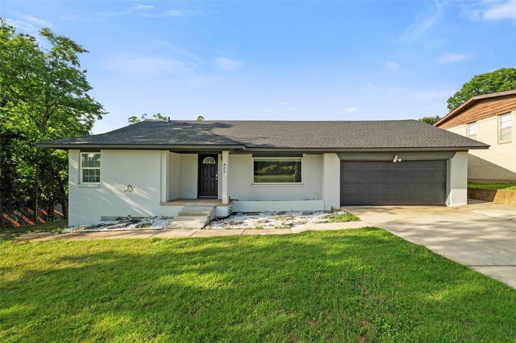 Property Photo: 421 E Tarrant Road TX 75050