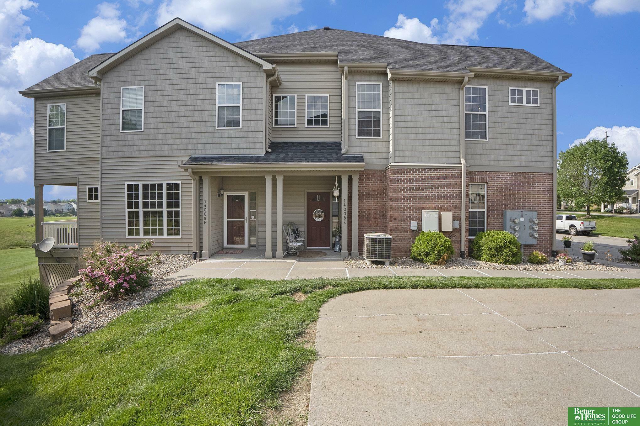Property Photo: 14008 Tregaron Ridge Avenue NE 68123