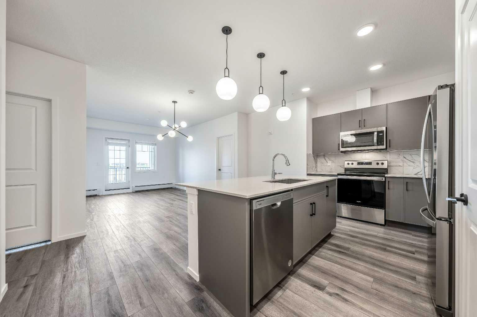Property Photo: 140 Mahogany Street SE 213 AB T3M 3H4