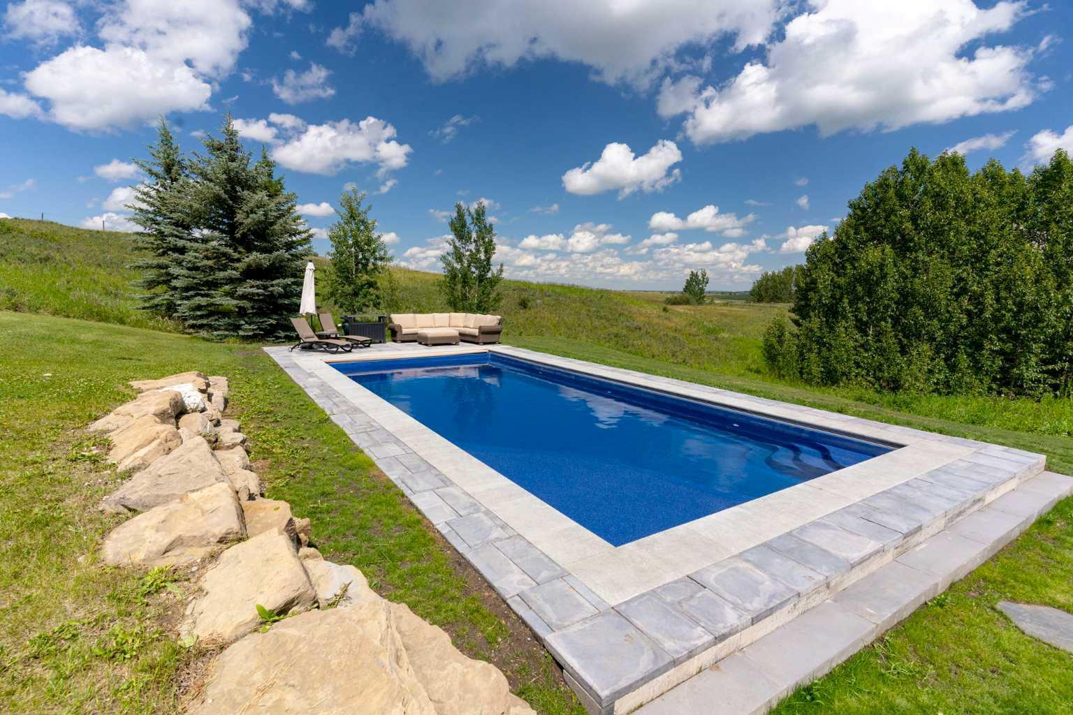 Property Photo: 58 Big Hill Springs Meadow AB T4C 0E5