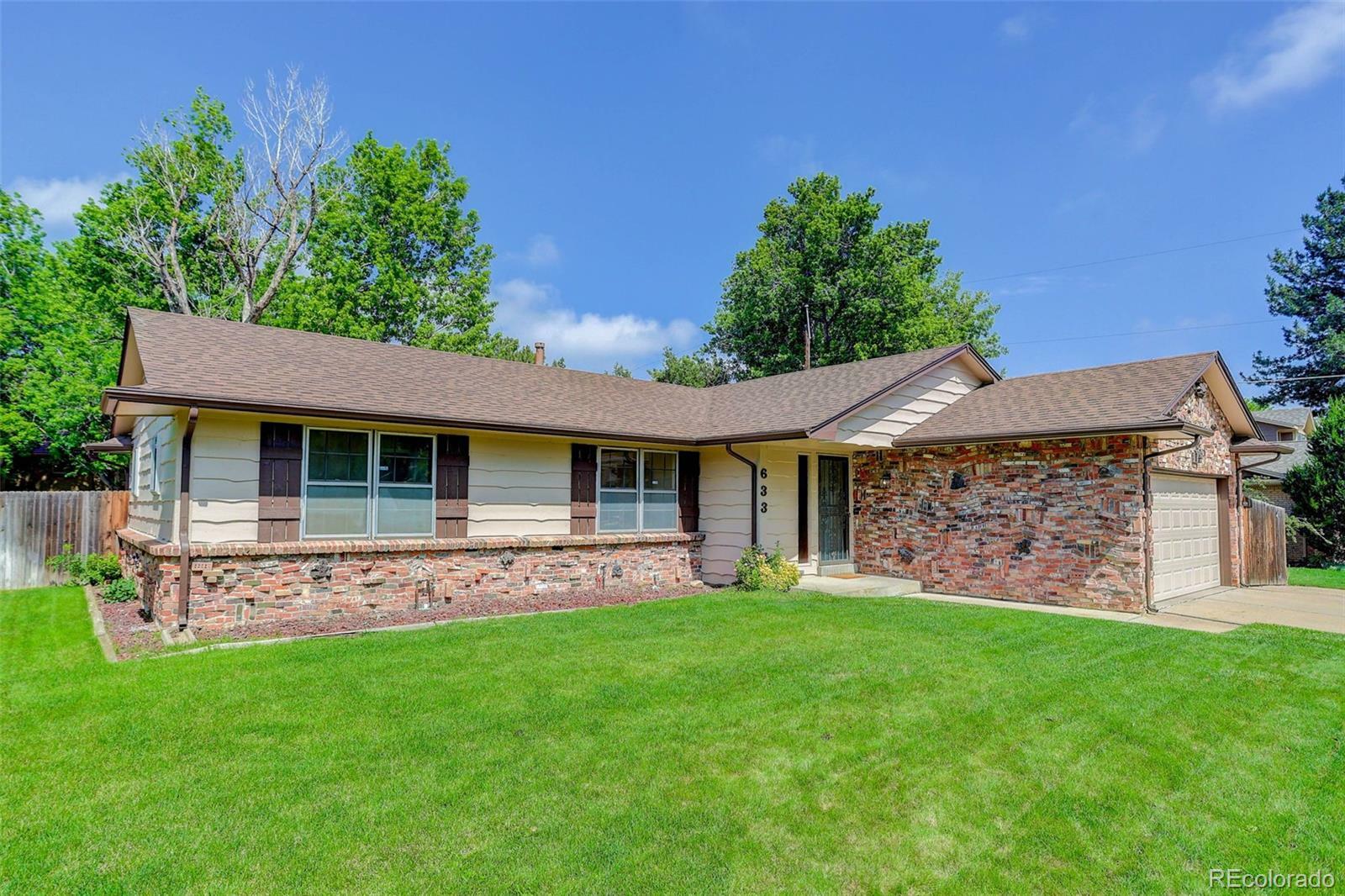 Property Photo:  633 S Galena Street  CO 80247 