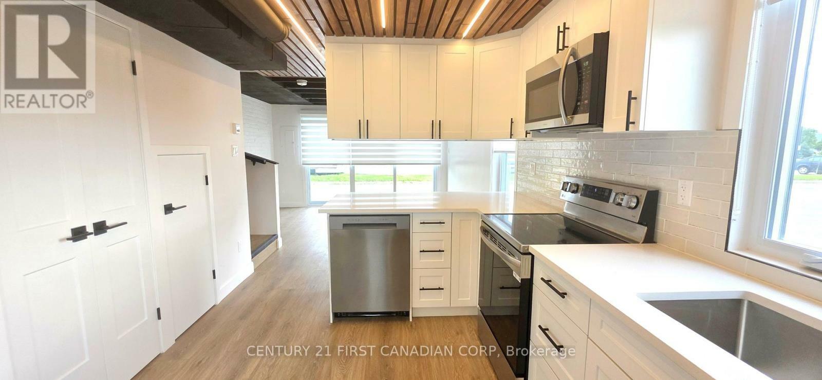 Property Photo: 857 Dundas Street 3 ON N5W 2Z8
