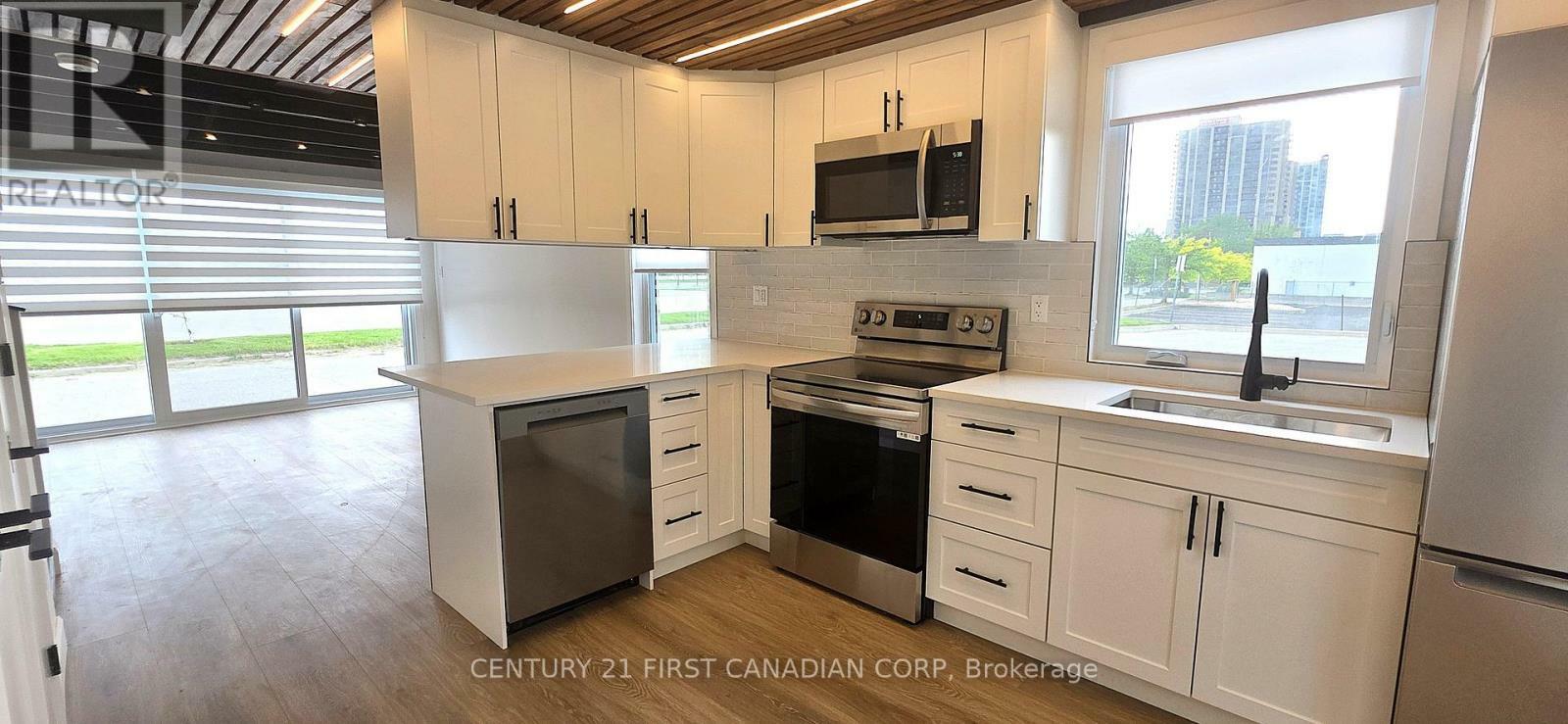 Property Photo: 857 Dundas Street 3 ON N5W 2Z8