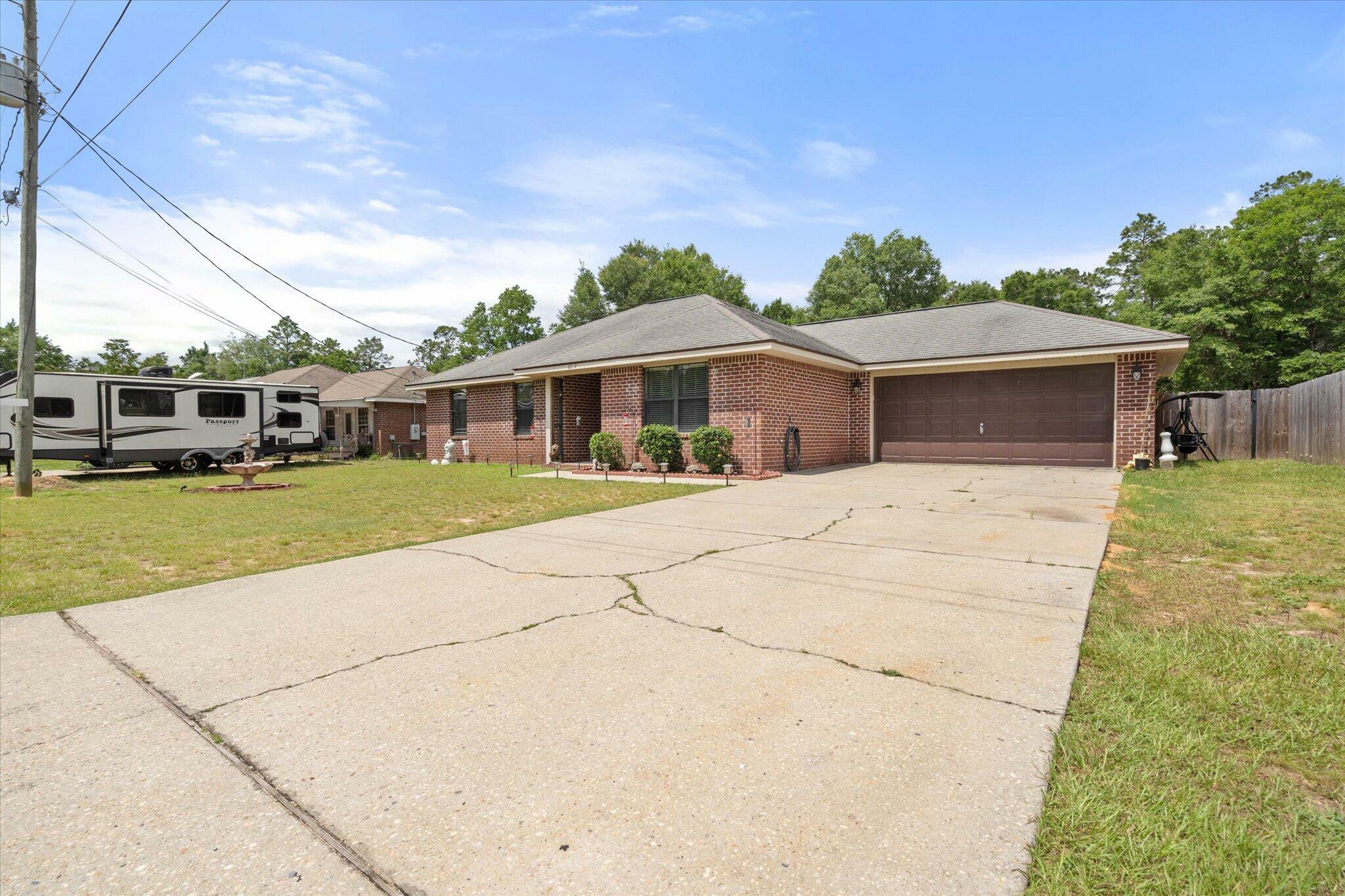 Property Photo: 6819 Old West Lane FL 32570