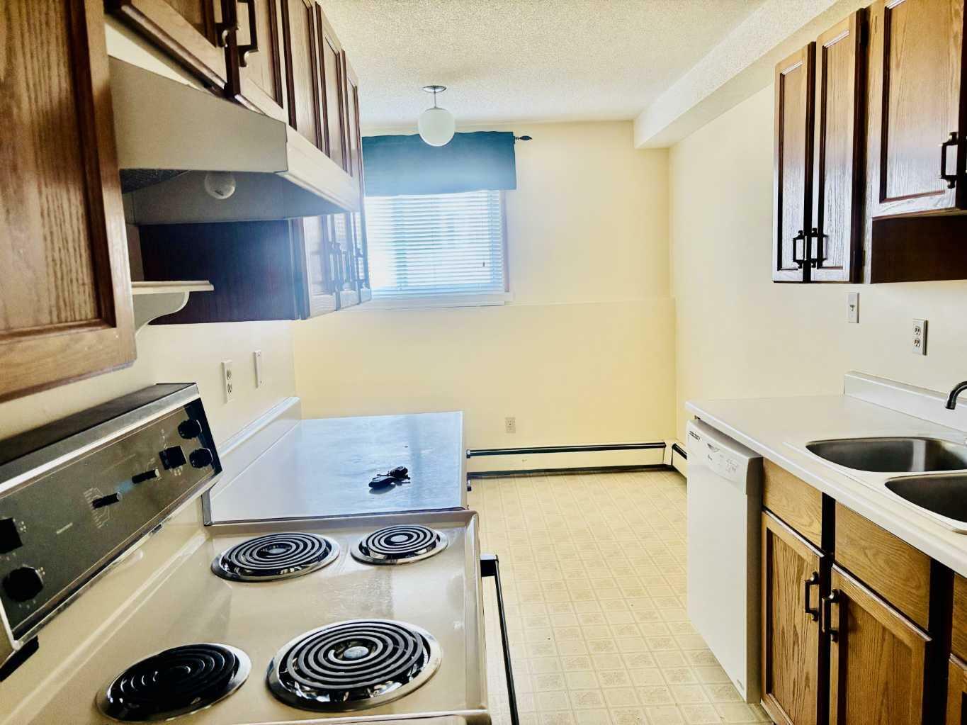 Property Photo: 5502 58A Street 103 AB T4N 2M3