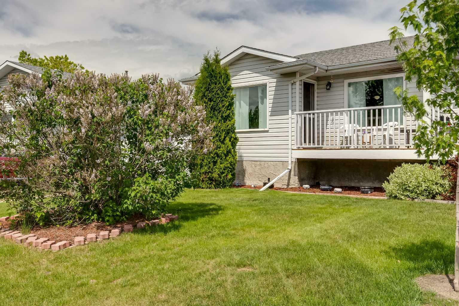 Property Photo: 102 Excell Street AB T2R 2H8