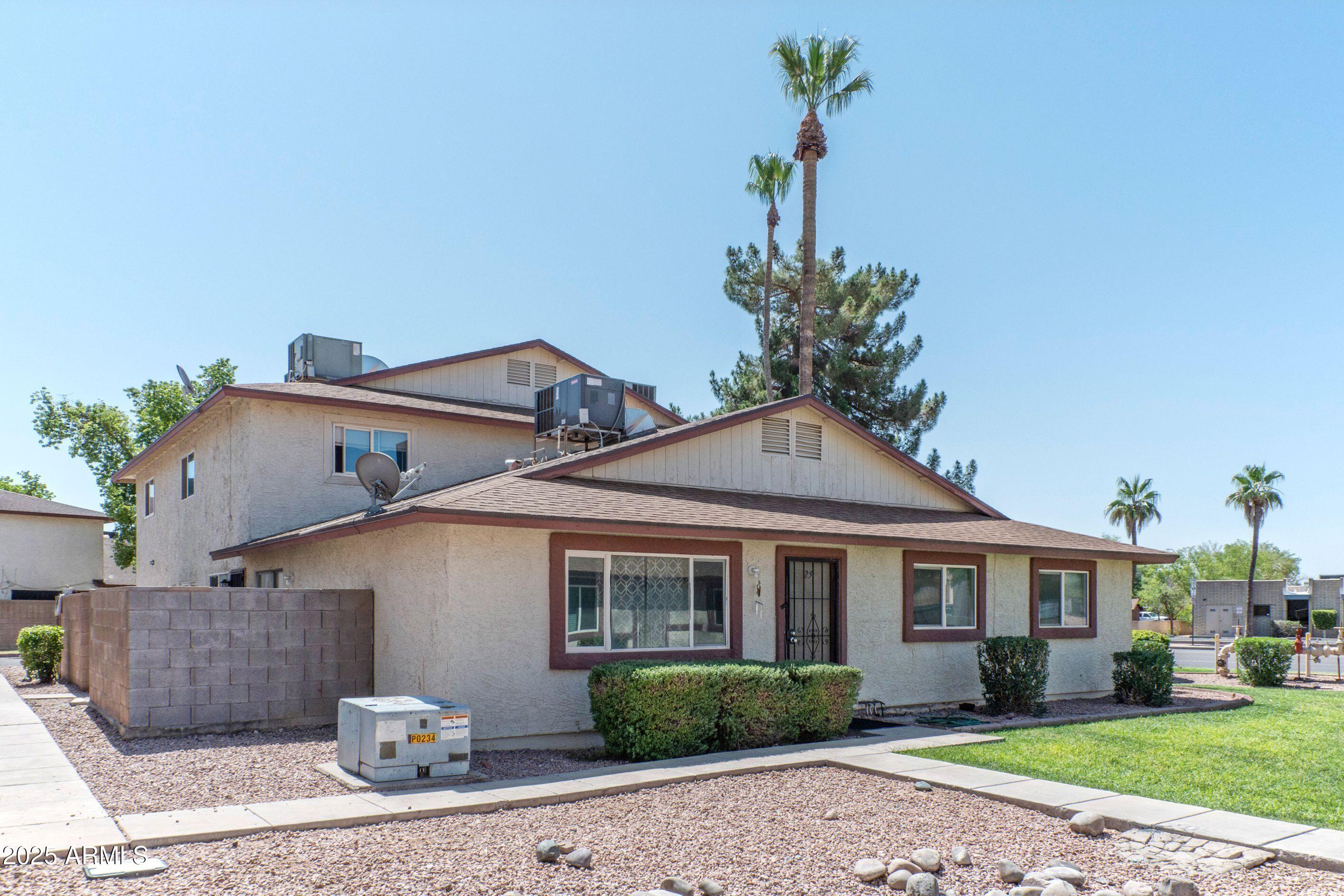 Property Photo: 860 E Brown Road 25 AZ 85203
