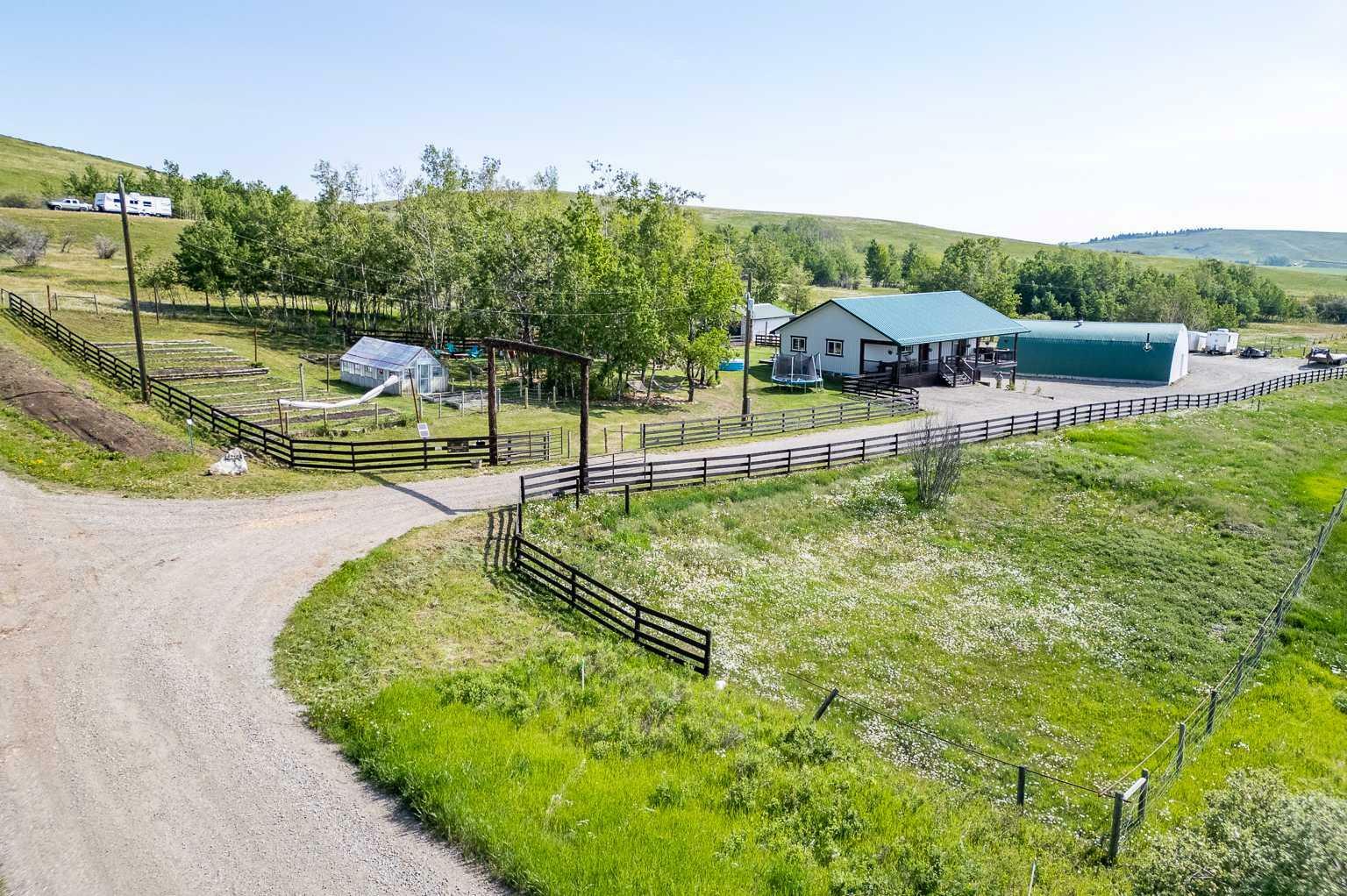 Property Photo: 482154 176 Street W AB T1S 1A1
