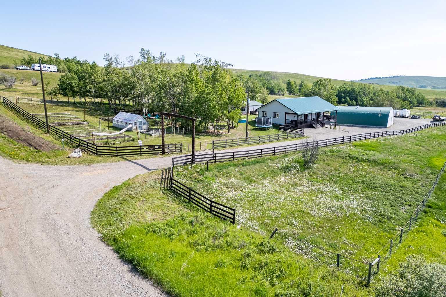 Property Photo:  482154 176 Street W  AB T1S 1A1 