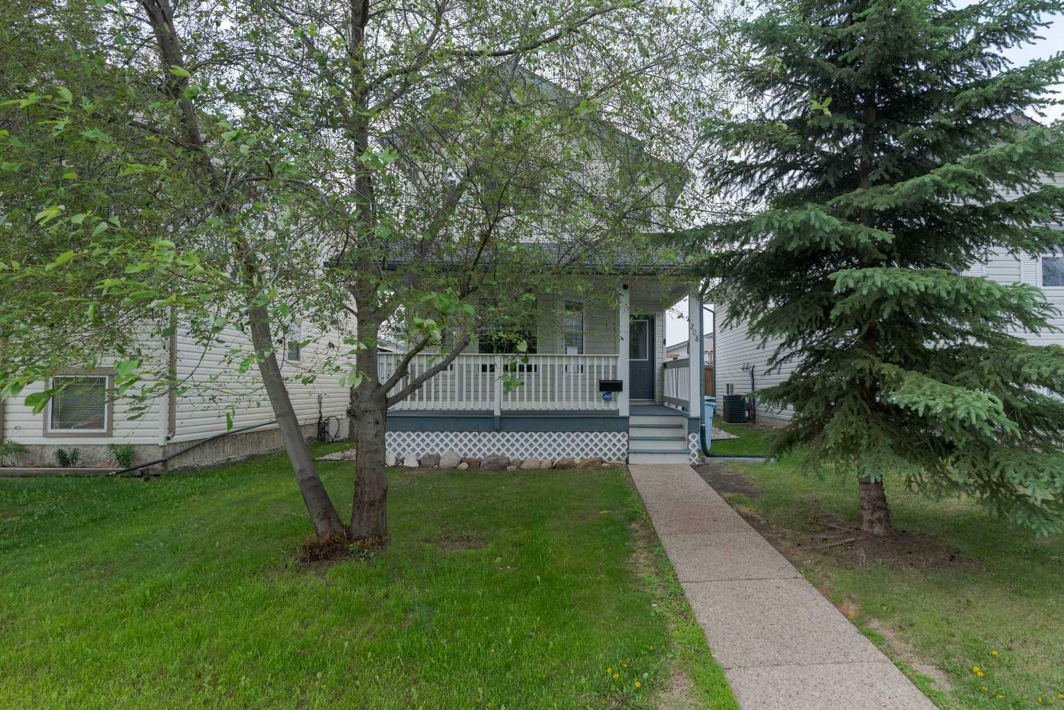 Property Photo: 208 Diefenbaker Drive AB T9K 2J9