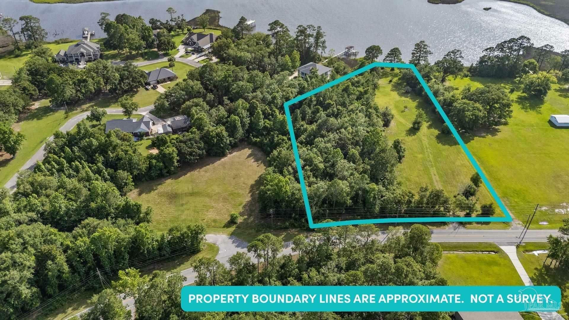 Property Photo:  4651 Mulat Rd  FL 32583 