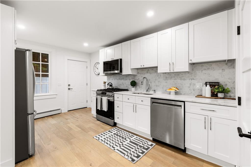 Property Photo: 51 Poplar Street 1L RI 02840